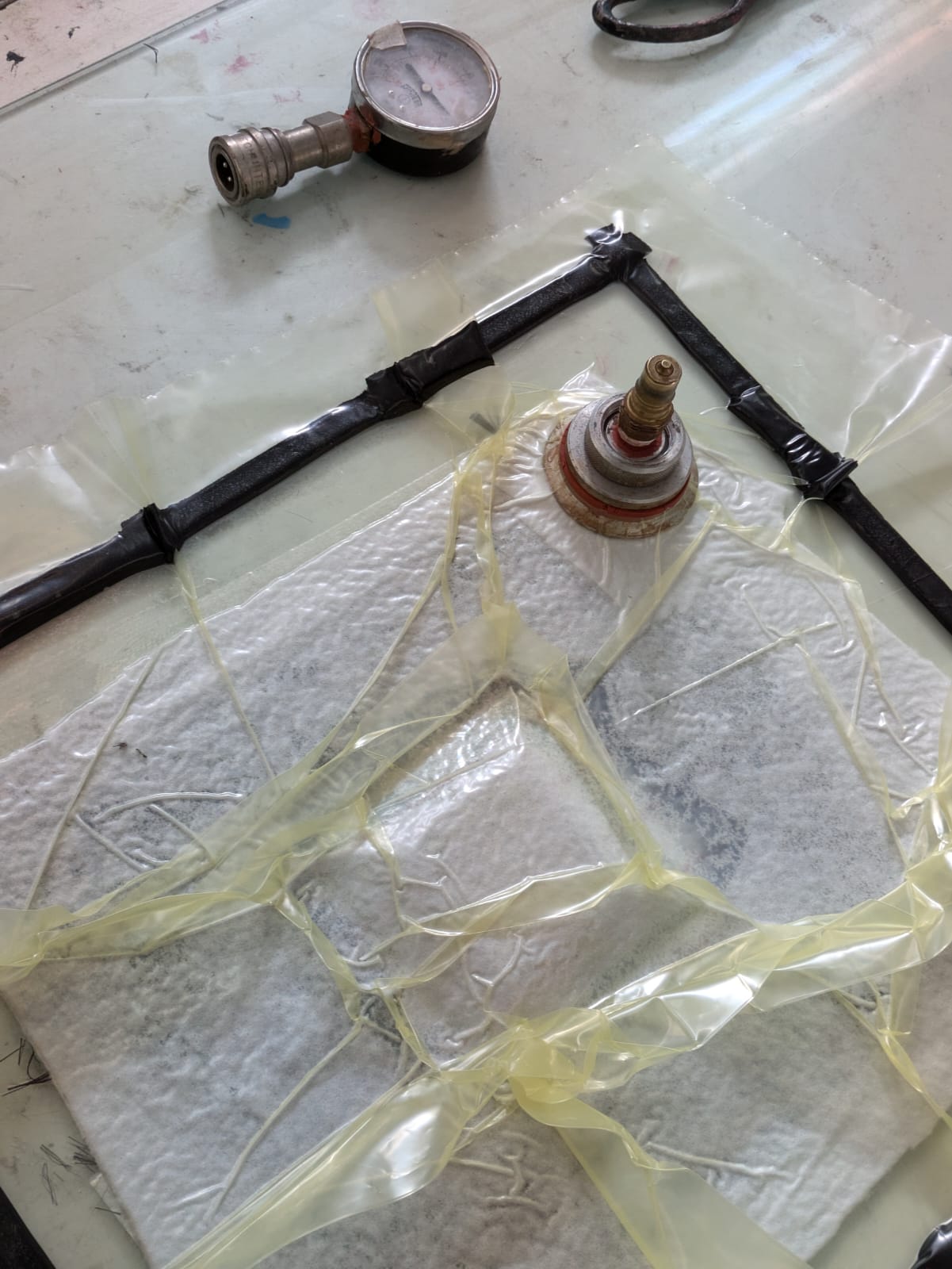 Vacuum-assisted composite process